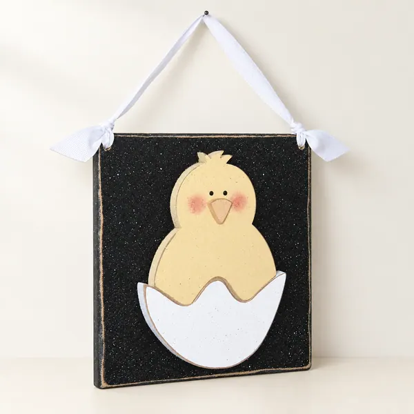 Hatching Easter Chick on a black board